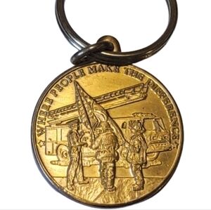 A Great Nation Stands United/Where People Make The Difference Medallion keychain